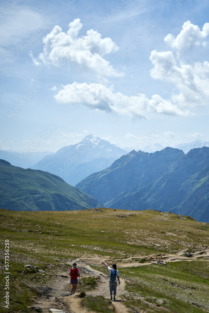 Hikers on a mountain trail in the Pyrenees, France
