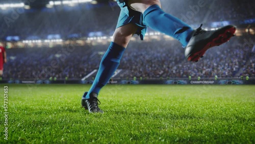 Aesthetic Shot Of Athletic Caucasian Footballer Shooting A Penalty Kick On Stadium With Crowd Cheering. International Soccer Championship Final Match With Fans On Tribune. Super Slow Motion.