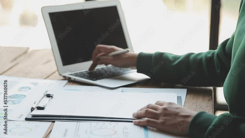 business african american Accounting using calculating income-expenditure and analyzing real estate investment data report Financial and tax systems concept. business african american Accounting using calculating income-expenditure and analyzing real estate investment data report Financial and tax systems concept.