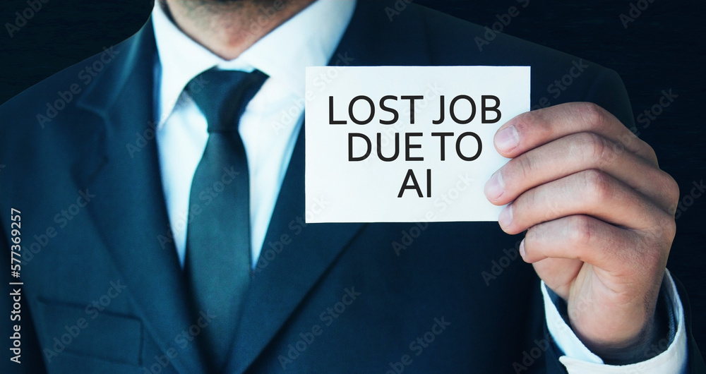 Man showing message Lost Job Due To Artificial Intelligence. Man showing message Lost Job Due To Artificial Intelligence.