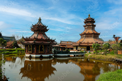 Samut Prakan, Thailand: One of the pastoral Phra Kaew Pavilions set in a pond and reached by a 3-span bridge at the ANCIENT SIAM Thai Heritage Park

