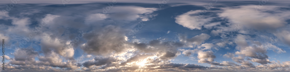 sunset sky with evening clouds as seamless hdri 360 panorama view with zenith in spherical equirectangular format for use in 3d graphics or game development as sky dome or edit drone shot
