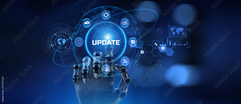 Update system software new version upgrade download. Robot hand pressing button on screen 3d render. Update system software new version upgrade download. Robot hand pressing button on screen 3d render.