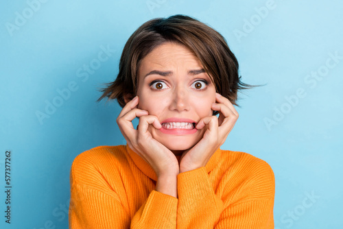 Fotografie Portrait of terrified impressed lady arms touch face grinning teeth isolated on