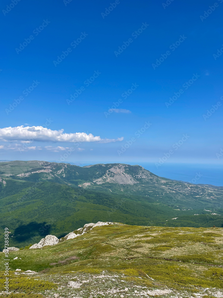 mountains with green forest rocks blue sky beautiful nature hike