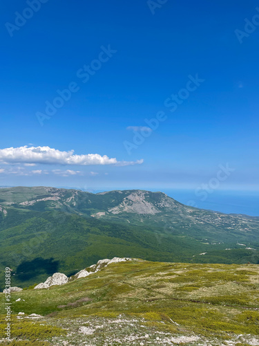 mountains with green forest rocks blue sky beautiful nature hike
