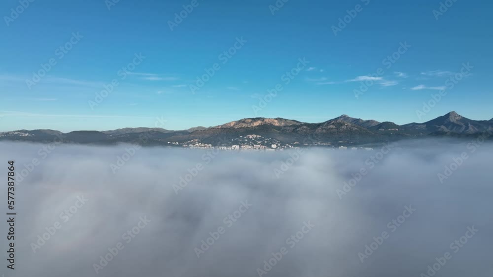 Mallorca in the fog with the town of Santa Ponca, Mallorca, Spain Mallorca in the fog with the town of Santa Ponca, Mallorca, Spain