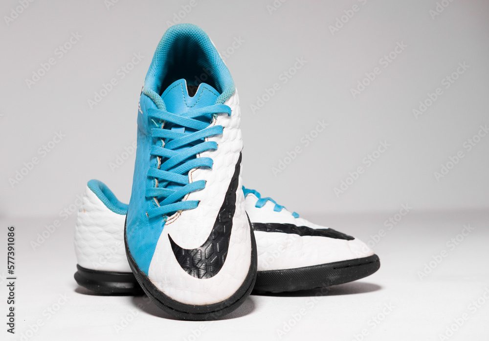 kent, uk 01.01.2023 Shoes football Kids Nike Hypervenom Phade 3 TF JR  Junior Trainers blue black and white training sports boots. iconic soccer  shoes. Stock Photo | Adobe Stock