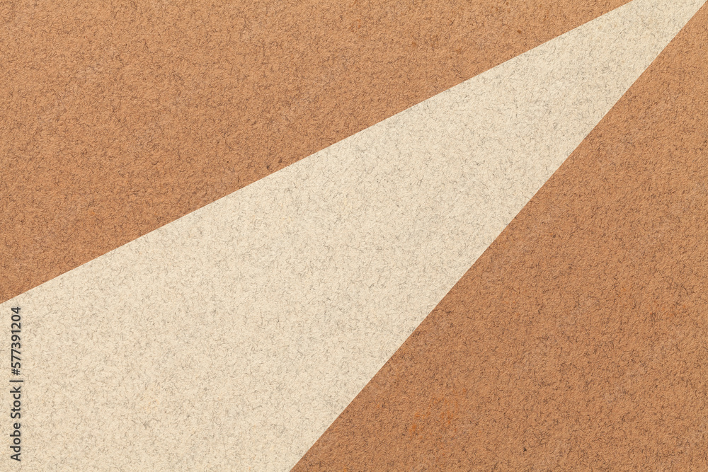 Texture of old craft beige and brown color paper background, macro. Structure of vintage abstract umber cardboard