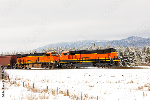 Wallpaper Mural Locomotives pulling freight train in a wintry scene outside of Whitefish, Montana. The Lead engine is reversed. Torontodigital.ca