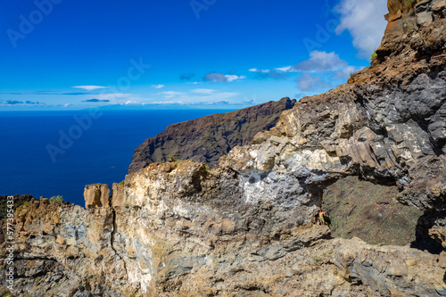 Aerial view above the impressive mountains and cliff of Los Gigantes in Tenerife Canary Islands