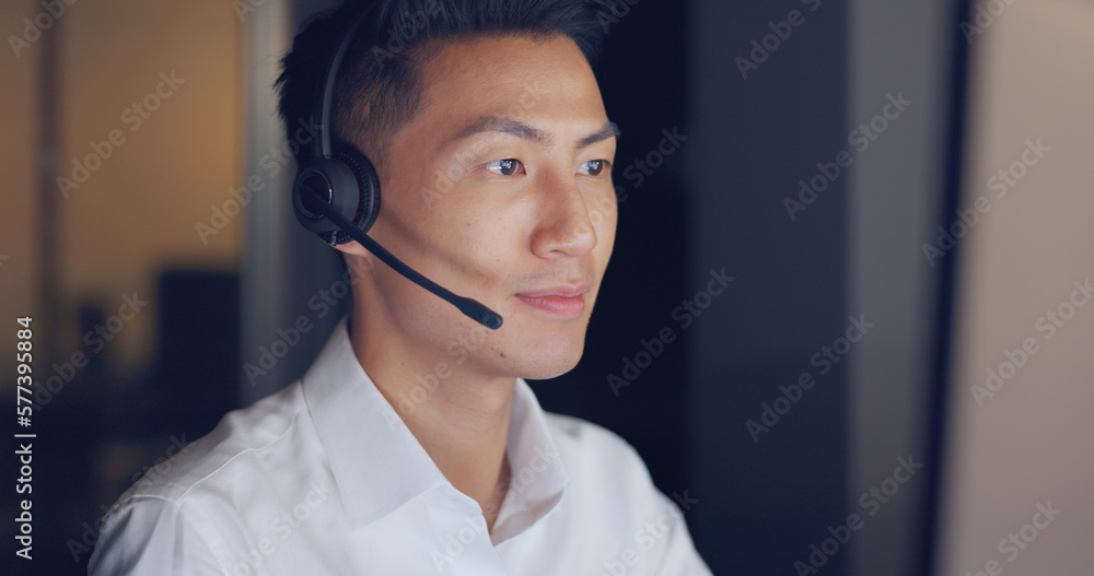 Call center, consultant and man, face and CRM, phone call with contact us communication and headset. Telemarketing, customer service or tech support, talk to client and happy Asian man with help desk Call center, consultant and man, face and CRM, phone call with contact us communication and headset. Telemarketing, customer service or tech support, talk to client and happy Asian man with help desk