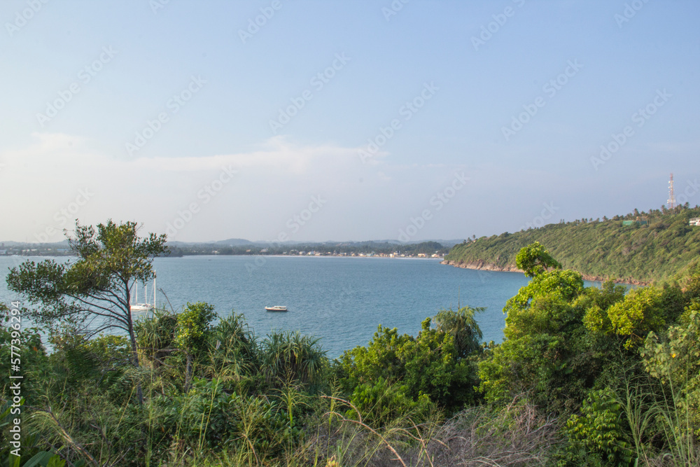 Beautiful view of the tropical beach of Sri Lanka on a sunny day Beautiful view of the tropical beach of Sri Lanka on a sunny day
