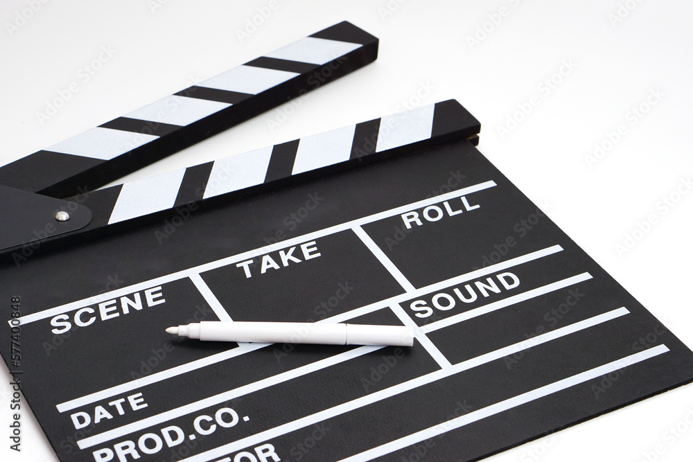 Clapperboard or movie slate black color and marker pen on white ...