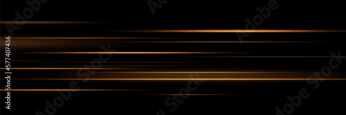 Set of golden lines, laser beams, bright light beams with sparkles and dust on a black background. vector illustration