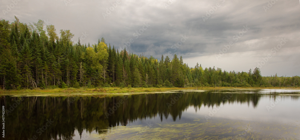Rain storm moving in over a small pond in Maine