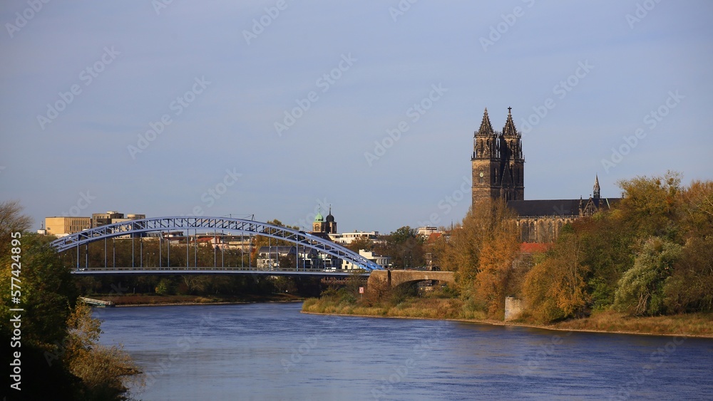 View on Elbe river in Magdeburg, the Sternbrucke and the Cathedral of Magdeburg can be seen