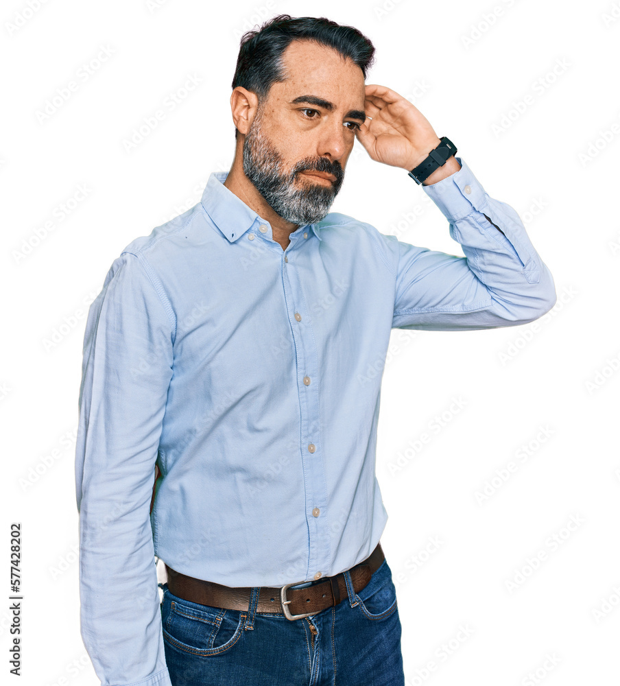 Middle aged man with beard wearing business shirt confuse and wondering about question. uncertain with doubt, thinking with hand on head. pensive concept. Middle aged man with beard wearing business shirt confuse and wondering about question. uncertain with doubt, thinking with hand on head. pensive concept.