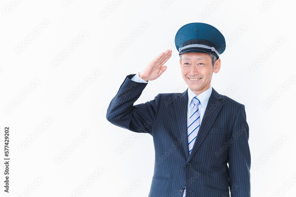 笑顔で仕事をする車掌 笑顔で仕事をする車掌