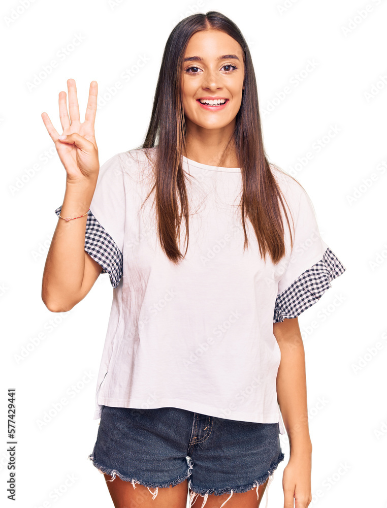 Young hispanic woman wearing casual clothes showing and pointing up with fingers number four while smiling confident and happy. Young hispanic woman wearing casual clothes showing and pointing up with fingers number four while smiling confident and happy.