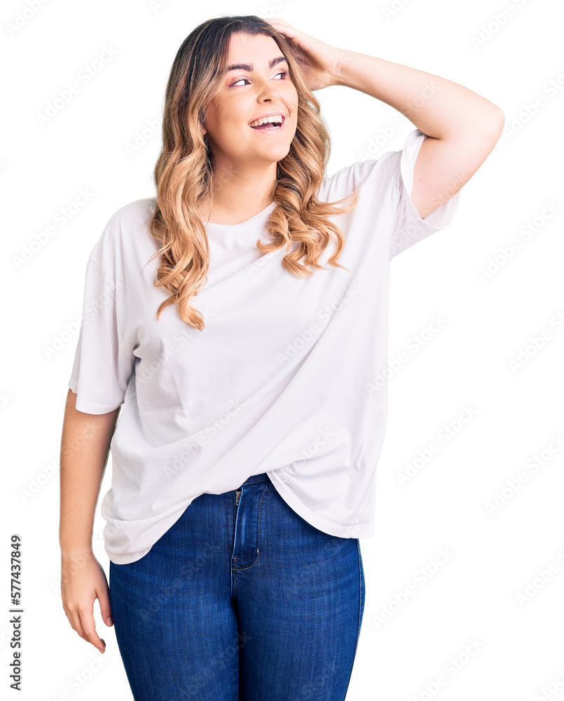 Young caucasian woman wearing casual clothes smiling confident touching hair with hand up gesture, posing attractive and fashionable Young caucasian woman wearing casual clothes smiling confident touching hair with hand up gesture, posing attractive and fashionable