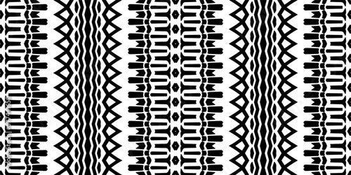 Vector geometric ornament in ethnic style. Seamless pattern with abstract shapes. Black and white geometric wallpaper. Repeating pattern for decor, textile and fabric.Abstraction art.