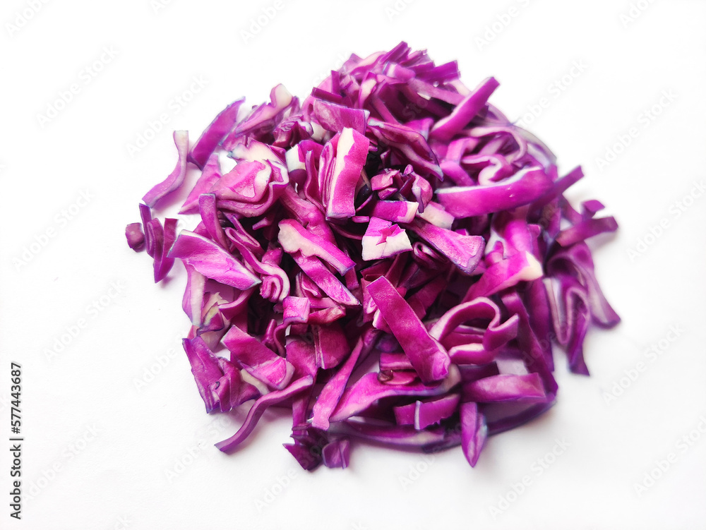 Chopped red cabbage or purple cabbage isolated on white background. Shredded cabbage. Cabbage slaw.Heap of chopped cabbage.