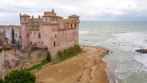 Aerial view of the Castle of Santa Severa, located in Santa Marinella in Lazio, in the Metropolitan City of Rome, Italy. It is a medieval castle built on the beach and overlooking the Tyrrhenian Sea.