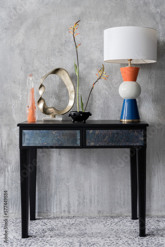 Eclectic decorations on console table photo