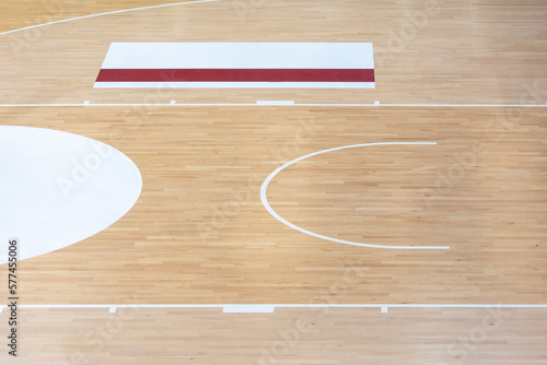 Wooden floor volleyball, basketball, badminton, futsal, handball court with light effect. Wooden floor of sports hall with marking lines line on wooden floor indoor, gym court
