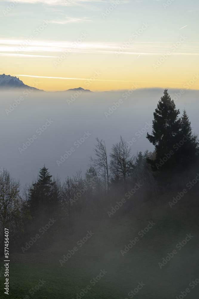 Sunset in the mountains above a sea of fog Sunset in the mountains above a sea of fog