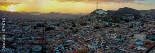 drone shot panoramic view of a sunset over oaxaca city mexico photo