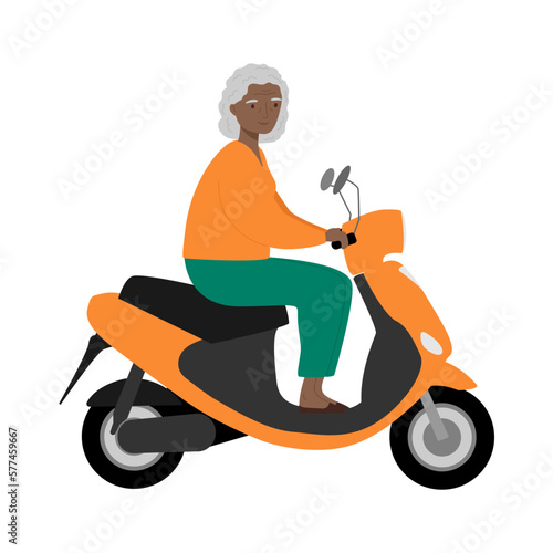 Senior woman traveling on modern motor scooter. Old woman riding electric scooter