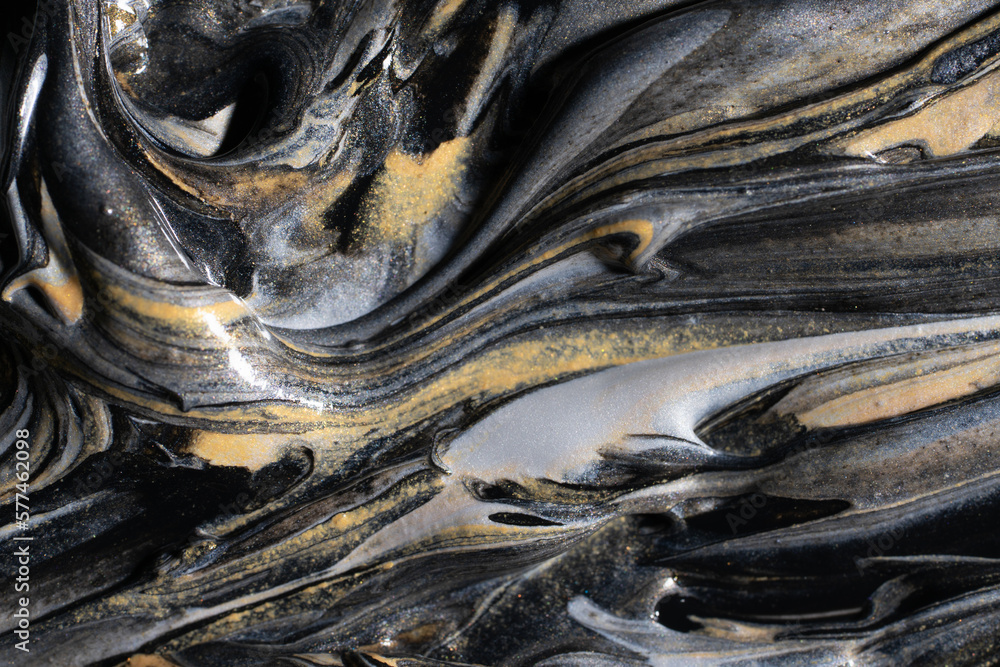 Golden and silver pigment in black dye Golden and silver pigment in black dye