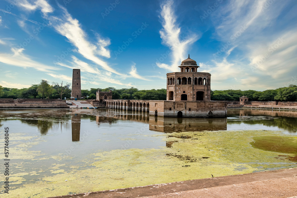 Fototapeta premium Experience the grandeur of Mughal architecture at Hiran Minar, a UNESCO World Heritage Site, exquisite minaret and tranquil lake in Sheikhupura, Pakistan, creates a truly enchanting scene