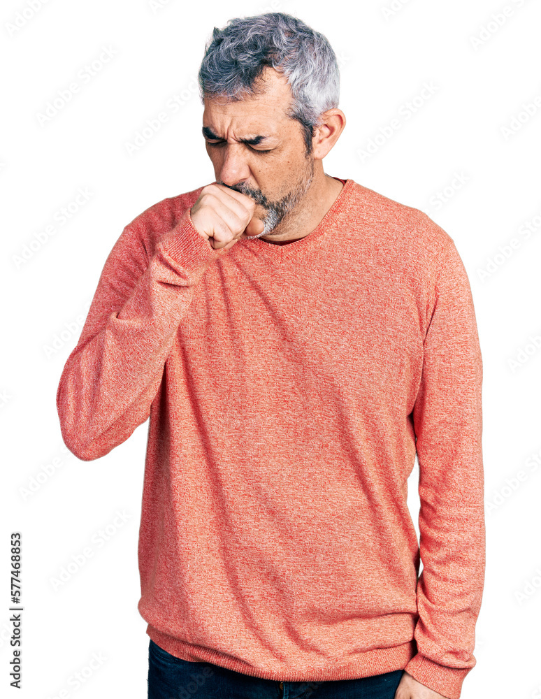 Middle age hispanic with grey hair wearing casual sweater feeling unwell and coughing as symptom for cold or bronchitis. health care concept. Middle age hispanic with grey hair wearing casual sweater feeling unwell and coughing as symptom for cold or bronchitis. health care concept.