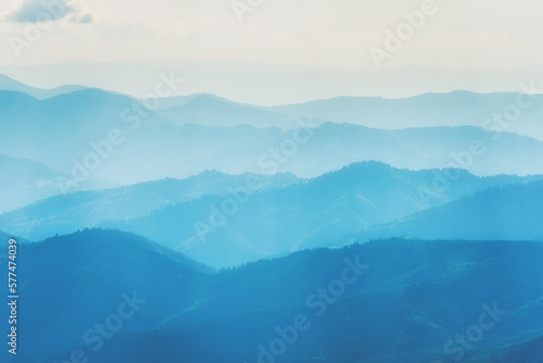 Fototapeta Naklejka Na Ścianę i Meble -  Blue mountains summit nature landscape with fog and mist