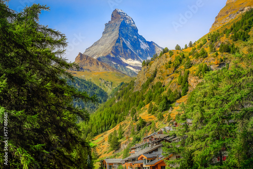 Matterhorn above zermatt idyllic valley at sunrise, Swiss Alps