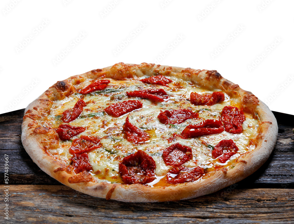 Pizza with dried tomatoes, rucula and mozzarella in pizzeria