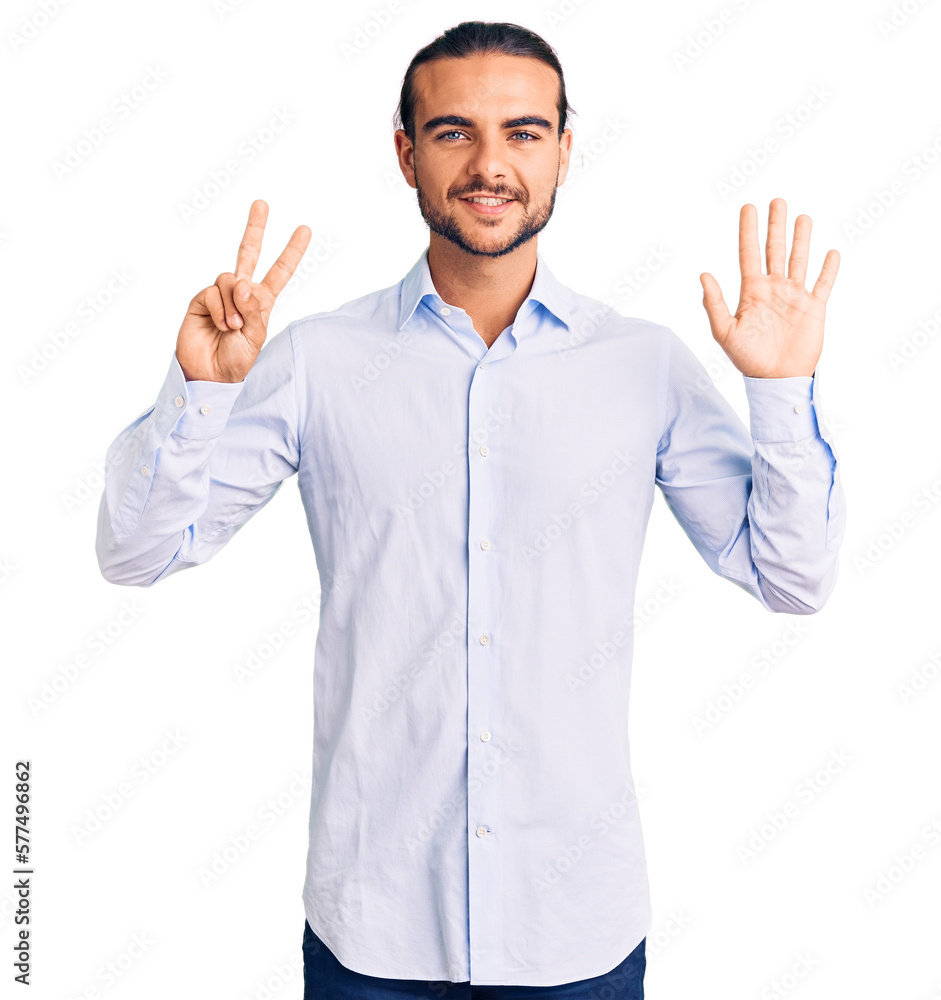 Young handsome man wearing business clothes showing and pointing up with fingers number seven while smiling confident and happy. Young handsome man wearing business clothes showing and pointing up with fingers number seven while smiling confident and happy.