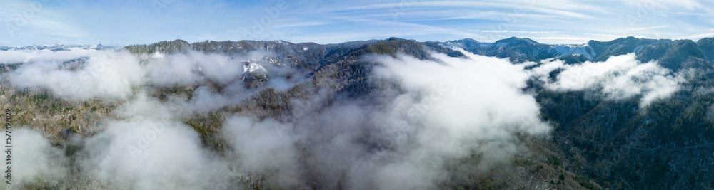 Clouds drift across the scenic coastal range of northern Oregon between Tillamook and Portland. The Coast Range is a series of mountain ranges along the Pacific coast, from Baja California to Alaska.