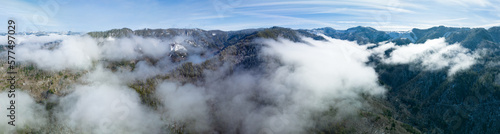 Clouds drift across the scenic coastal range of northern Oregon between Tillamook and Portland. The Coast Range is a series of mountain ranges along the Pacific coast, from Baja California to Alaska.