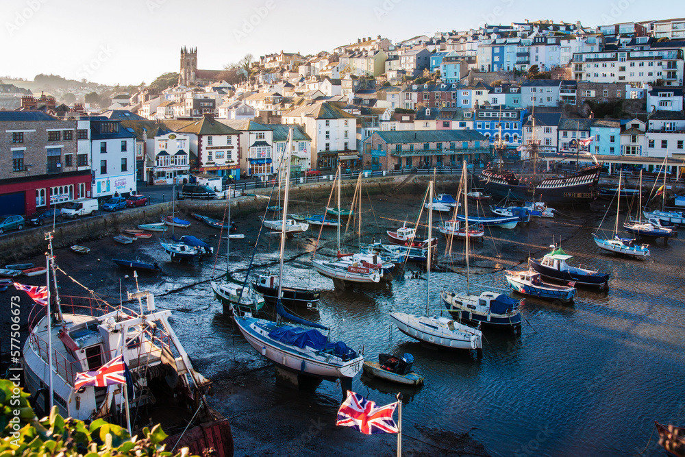 Fishing boats in the harbour at Brixham on the south coast of Devon in the Torbay district. Brixham is a small fishing village in the English Riviera, it is a magnet for tourists in the summer.