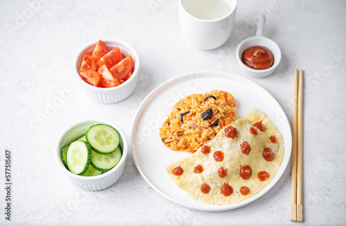 Omurice in the form of sleeping bear in a plate