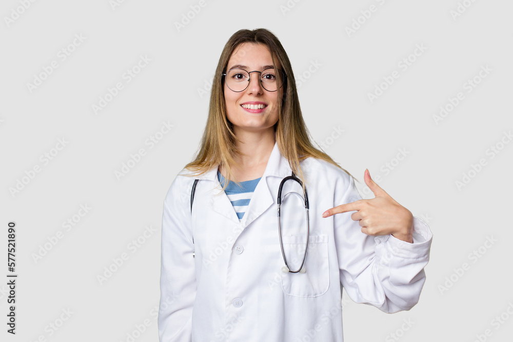 Compassionate female physician with a stethoscope around her neck, ready to diagnose Compassionate female physician with a stethoscope around her neck, ready to diagnose