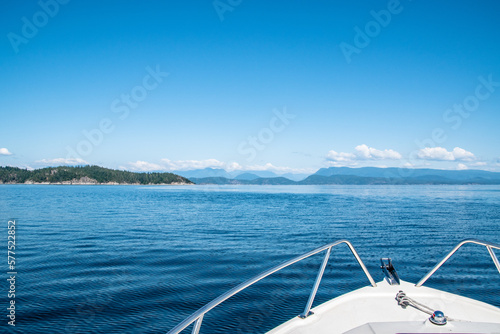 Bow of Boat Looking Towards Tropical Mountains & Island on Summer Day Along Strait of Georgia in Vancouver Island, British Columbia, Canada