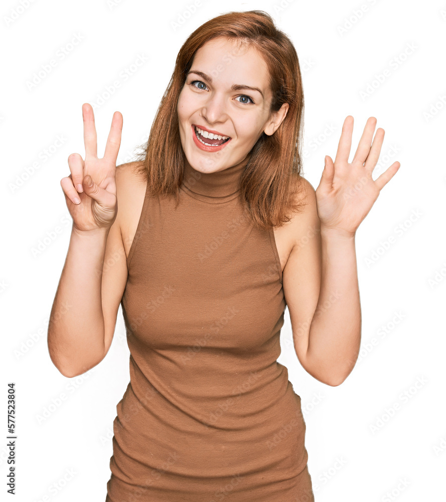 Young caucasian woman wearing casual clothes showing and pointing up with fingers number seven while smiling confident and happy. Young caucasian woman wearing casual clothes showing and pointing up with fingers number seven while smiling confident and happy.