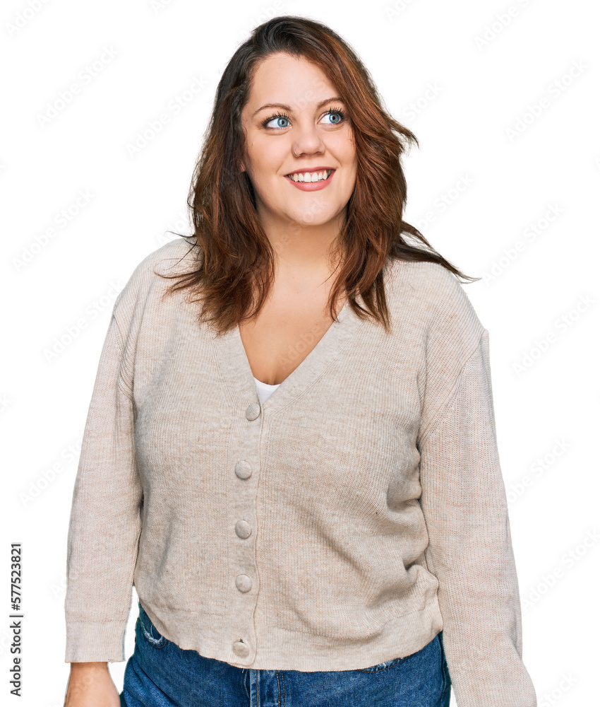 Young plus size woman wearing casual clothes looking away to side with smile on face, natural expression. laughing confident. Young plus size woman wearing casual clothes looking away to side with smile on face, natural expression. laughing confident.