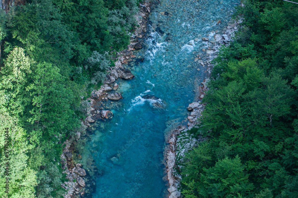 Top view of Djurdjevica Tara bridge on the turquoise water of Tara river flowing through majestic green tara canyon (Pljevlja, Montenegro).