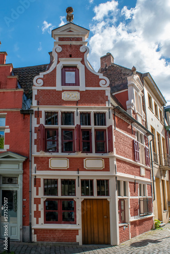 Unusual, centuries old facades line a street in a small town in Belgium.